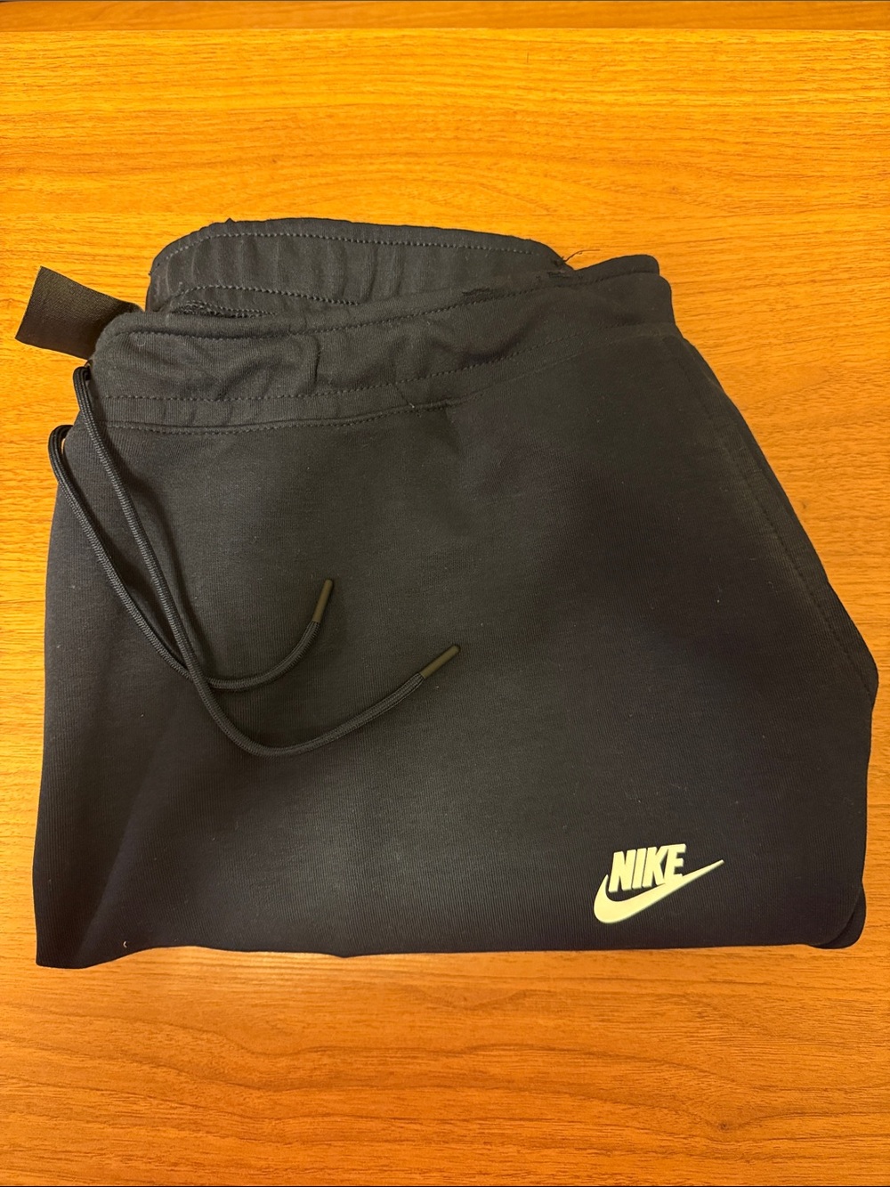Nike Black Joggers with White Swoosh and Cream Accent